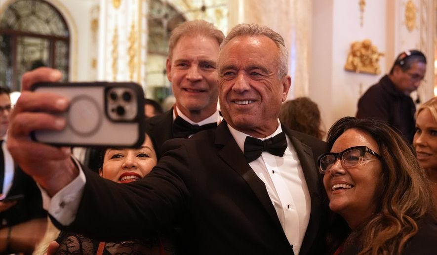 Robert F. Kennedy Jr. arrives before President-elect Donald Trump speaks during an America First Policy Institute gala at his Mar-a-Lago estate, Thursday, Nov. 14, 2024, in Palm Beach, Fla. (AP Photo/Alex Brandon)