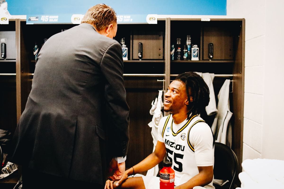 Missouri assistant coach Dickey Nutt chats with Tigers' guard Sean East after defeating Utah State 76-65 in the First Round of the NCAA Tournament on March 16, 2023, in Sacramento, Calif.