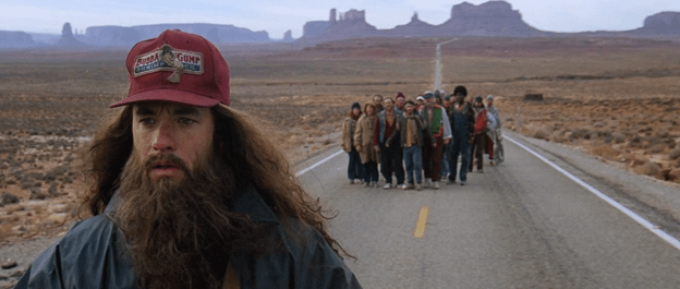 In Forrest Gump (1994), when he runs across America, the people following  him were real people who decided to follow Tom Hanks while the scene was  being filmed. You can tell their