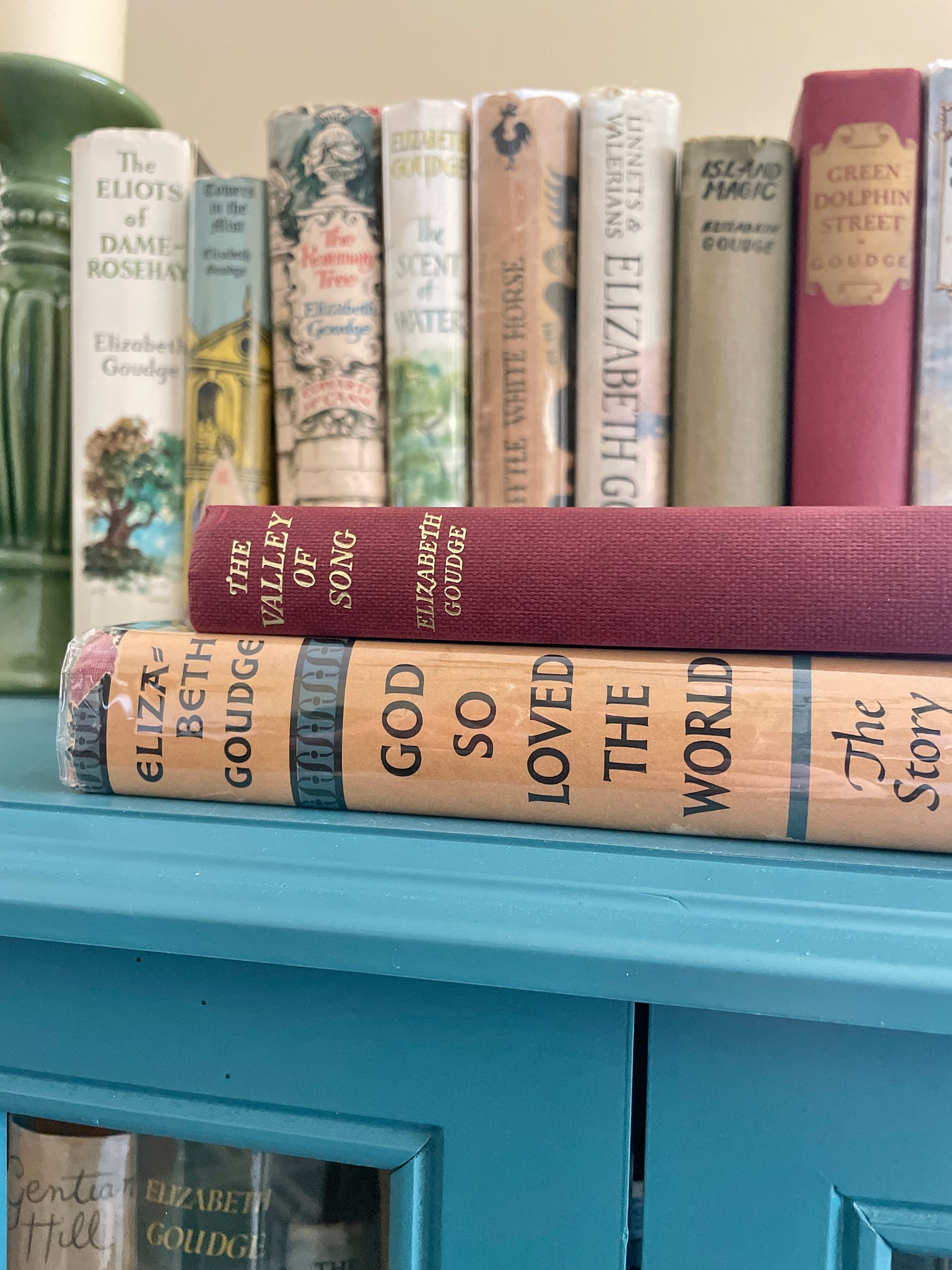 Copies of God So Loved the World and The Valley of Song by Elizabeth Goudge on my Goudge bookcase.