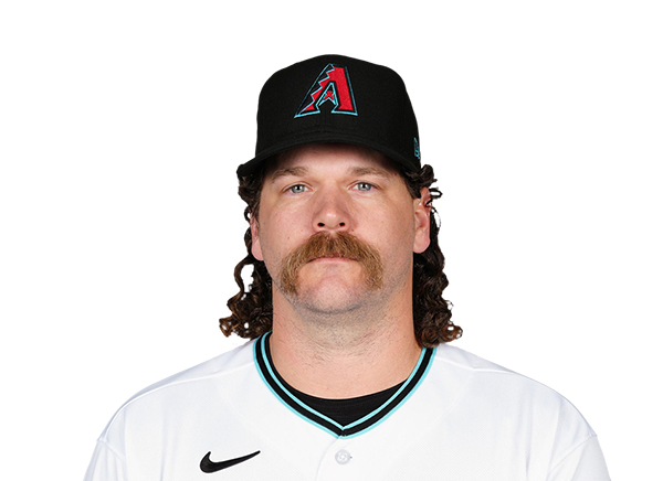 Andrew Chafin, with a long wet, curly mullet and a big walrus mustache