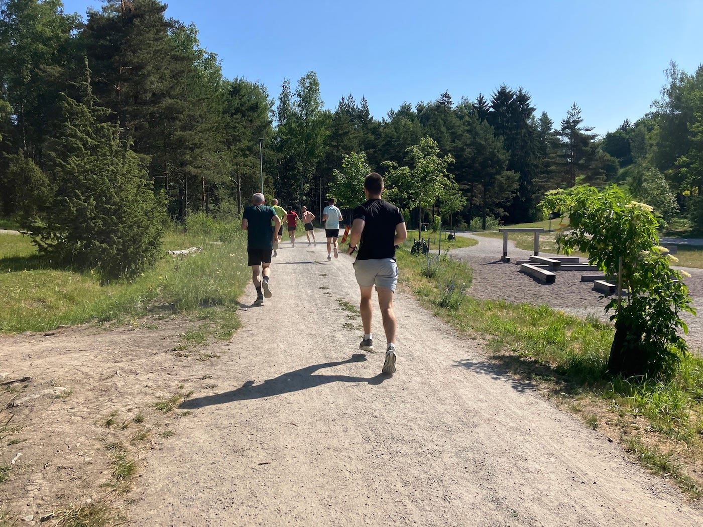 Running on a gravel path in open air.