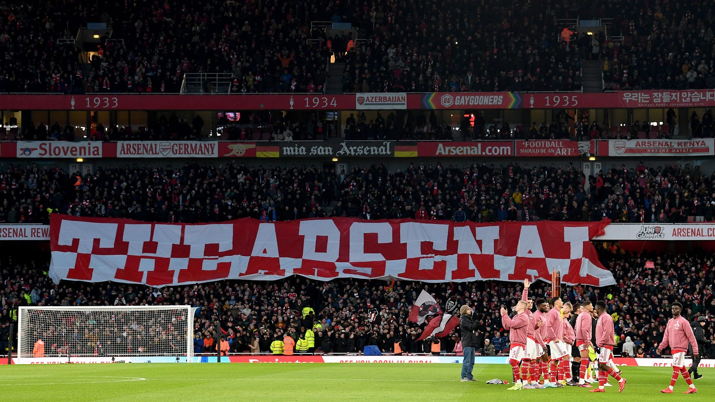 Our Gunners lining up for kick off with "The Arsenal" flag in the stands
