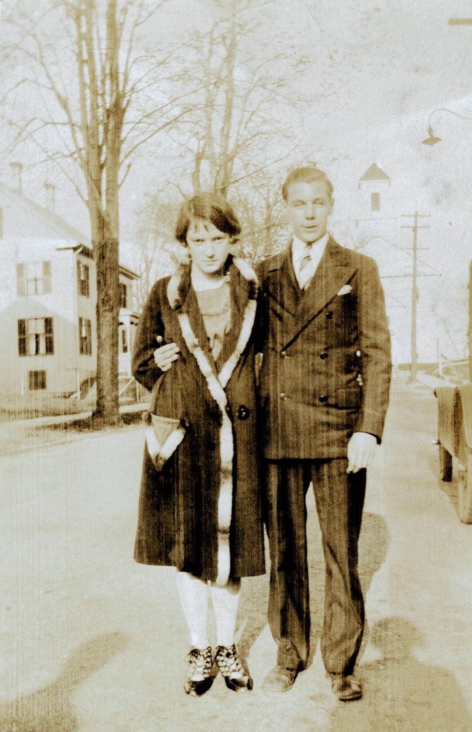 Man and woman standing in street