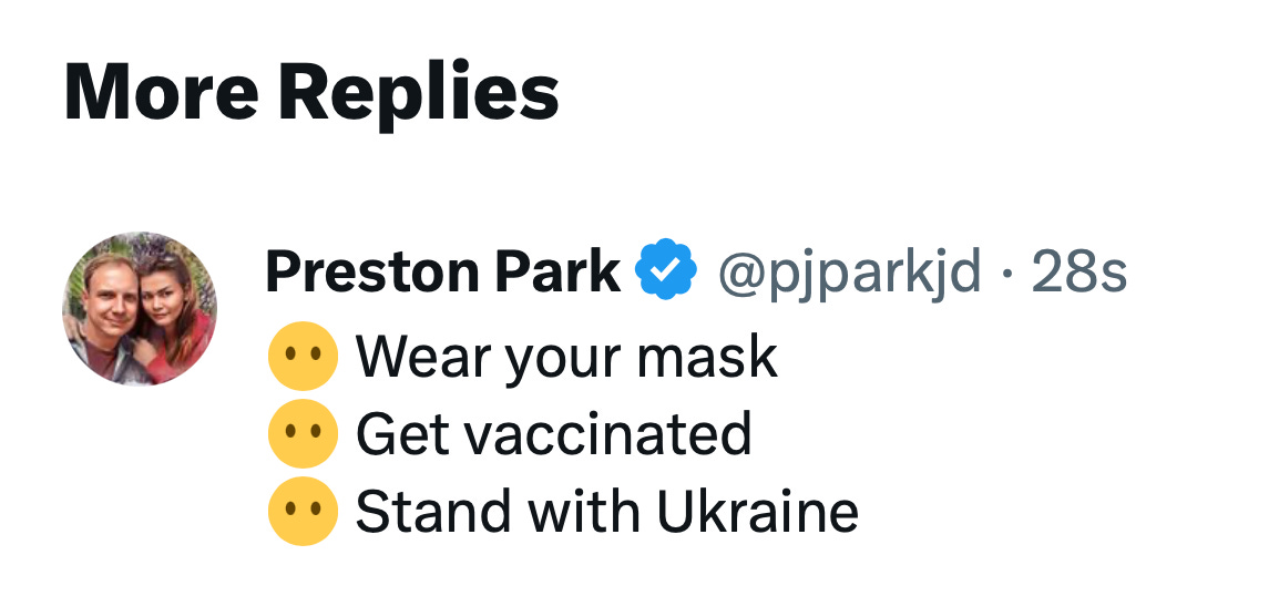 Screenshot of comment under "More Replies." The text of the comment is: Wear your mask. Get vaccinated. Stand with Ukraine.
