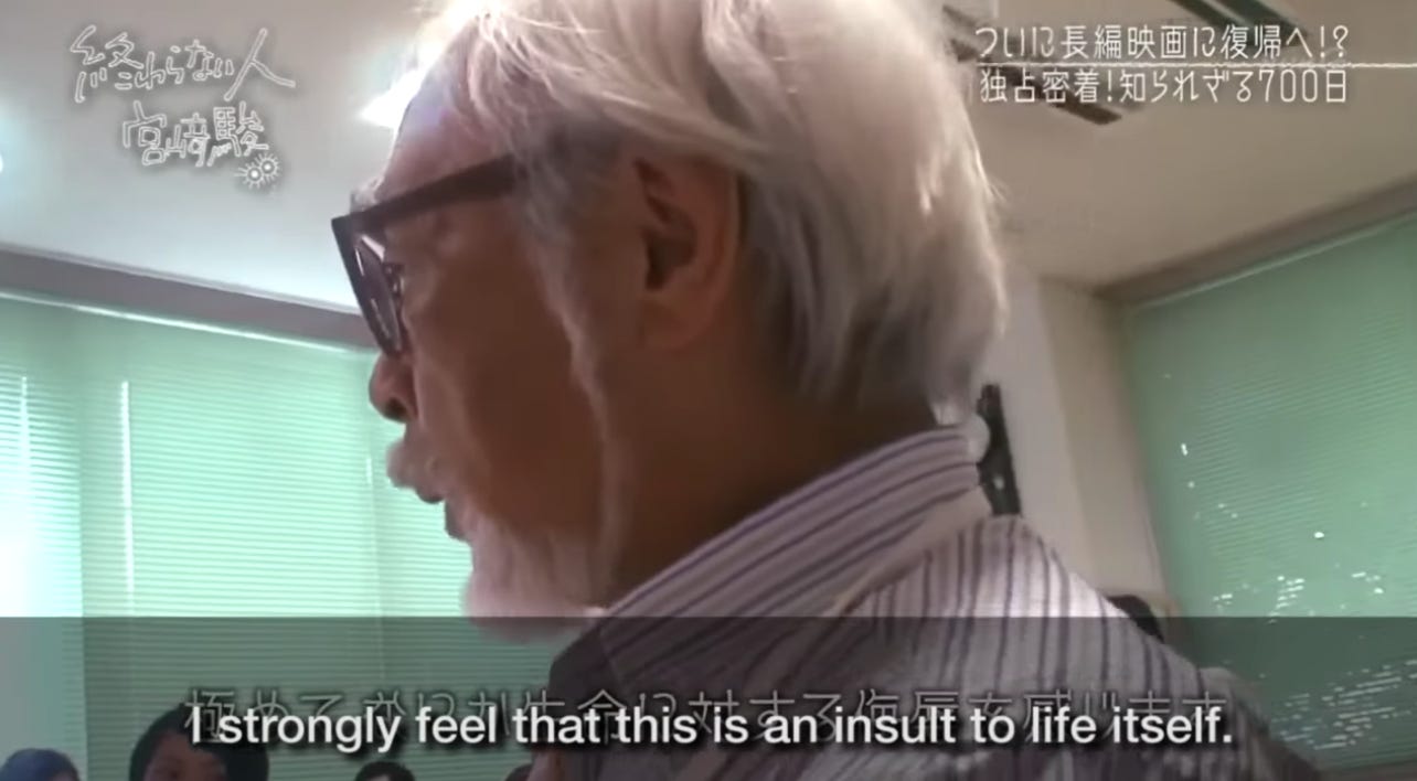 A still of Hayao Miyazaki (an older Japanese man with white hair and thick glasses) with the subtitle "I strongly feel that this is an insult to life itself" from the video linked in the caption.