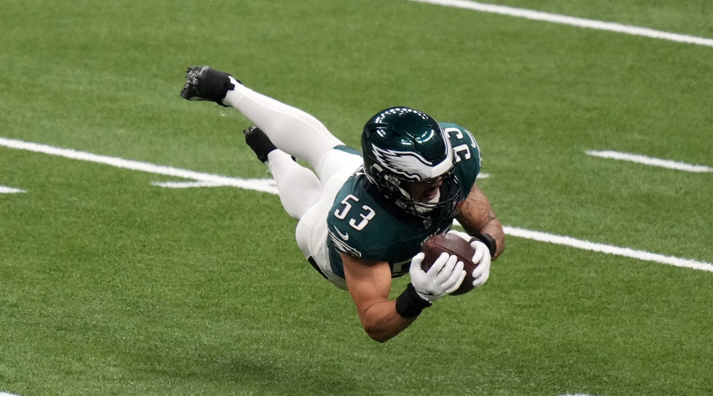 Philadelphia Eagles linebacker and former Wisconsin Badgers star Zack Baun (53) makes an interception against Kansas City Chiefs quarterback Patrick Mahomes in Super Bowl LIX