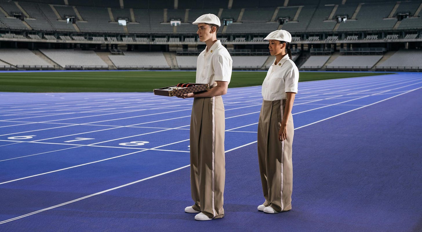 Cover Paris 2024 and LVMH unveil eco-designed outfits for volunteer medals bearers during Victory Ceremonies and medals trays designed by Louis Vuitton for the Olympic and Paralympic Games Paris 2024 