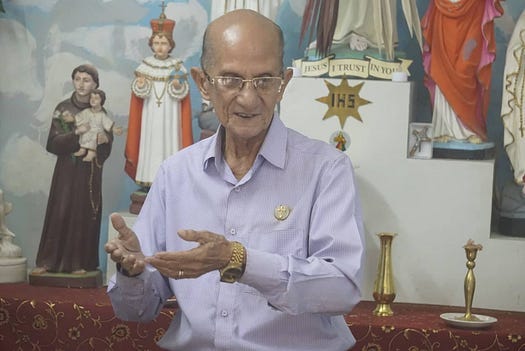 Melvyn Brown, giving a talk in front of the Divine Mercy Altar, at his home, in Elliott Road, Kolkata. RIP Melvyn Brown.