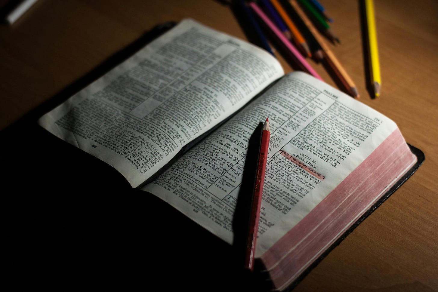 Open Bible pencils highlighted text