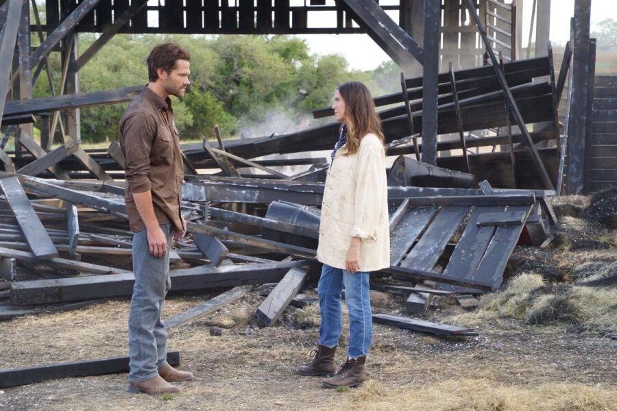 Cordell with Geri outside burned down barn from old lantern 2.20