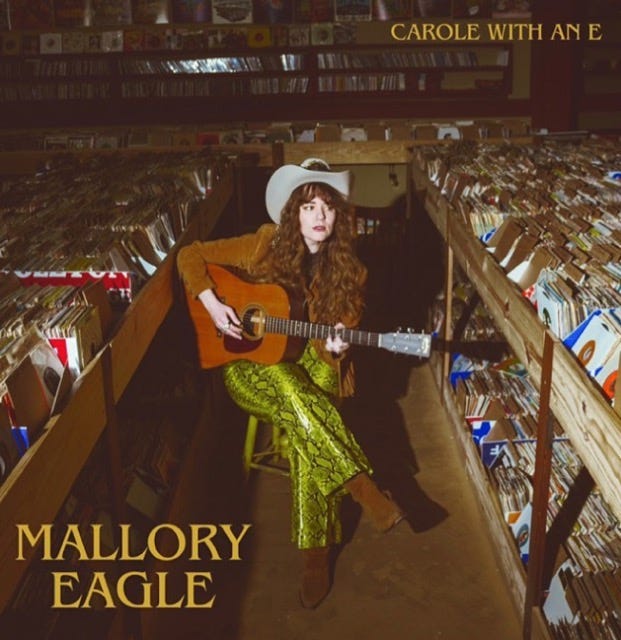 Mallory Eagle's album cover - Artist Sitting in Record Store with Guitar 