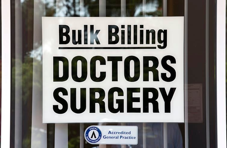A sign advertising Bulk Billing on a window of a doctors surgery in Brisbane