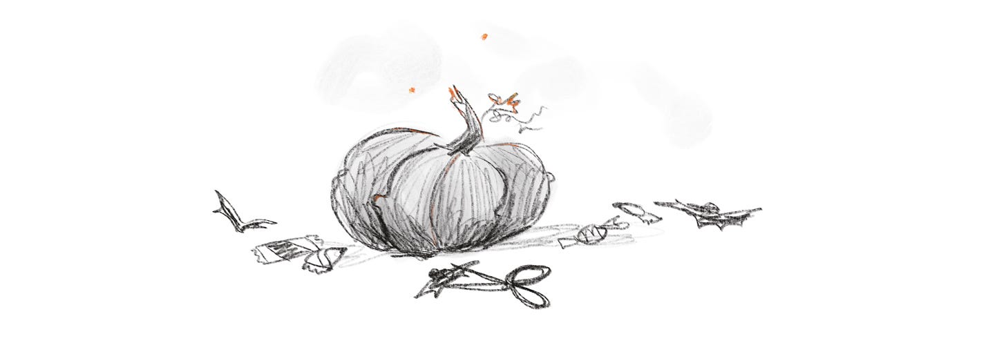 A sketch of a pumpkin, candy strewn around, and bits of black paper bats and a pair of scissors. All have little sparks, smoking.