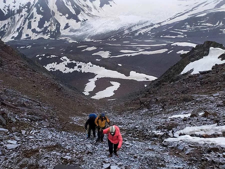 Yunam Peak trekker approaching the summit in Himachal Pradesh