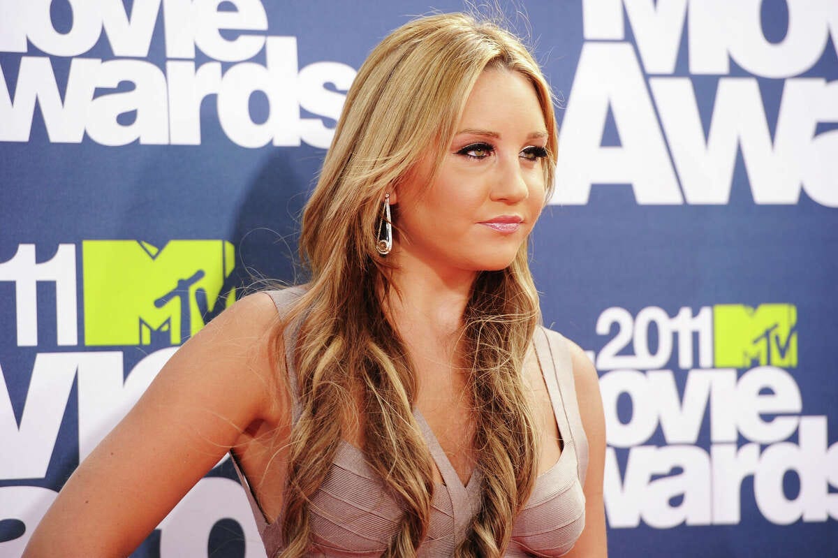 Actress Amanda Bynes arrives at the 2011 MTV Movie Awards at Universal Studios' Gibson Amphitheatre in June 2011 in Universal City, Calif. Due to health concerns, the actress's appearance at 90s Con at the Connecticut Convention Center in Hartford this weekend has been canceled, according to That's 4 Entertainment.