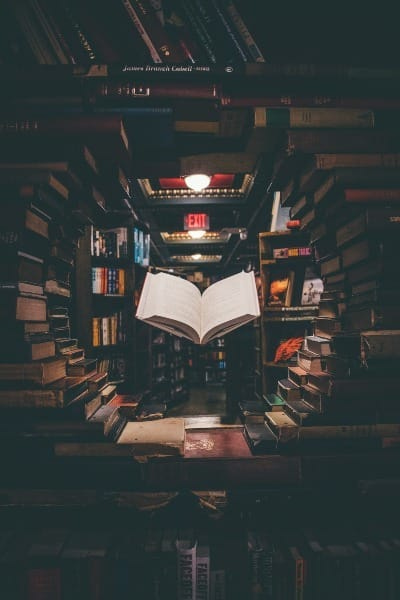 Image of books swirling in library