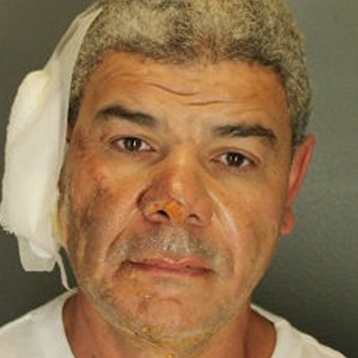 Booking photo released by Boulder Police of 45-year-old Mohamed Sabry Soliman after his arrest in a terrorist firebombing. Booking photo released by Boulder Police of 45-year-old Mohamed Sabry Soliman after his arrest in a terrorist firebombing.