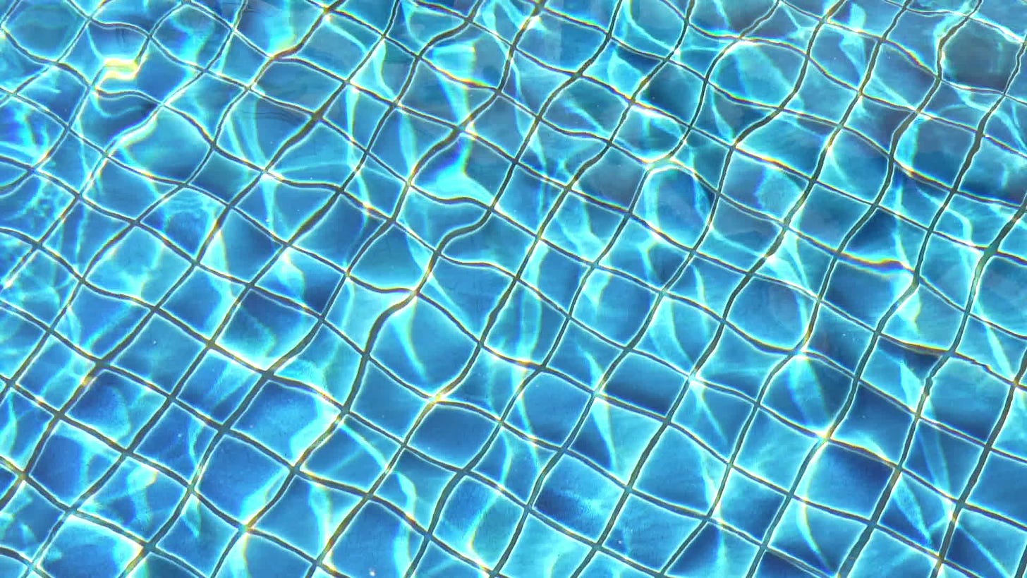 Sunlight Reflected on Pool Water Background 2007888 Stock Video at Vecteezy