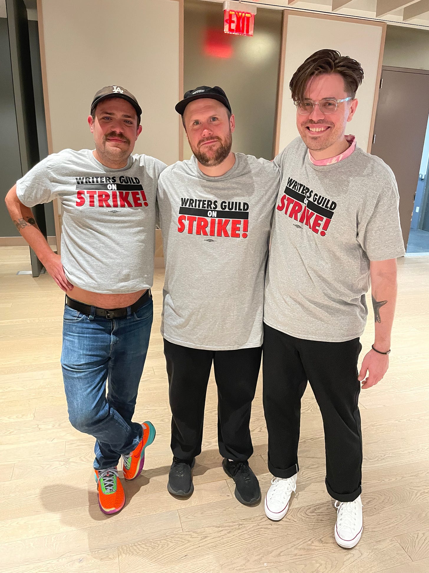 Zack and Steve from Pup along with Jeff Rosenstock wearing WGA strike t-shirts, like champs.