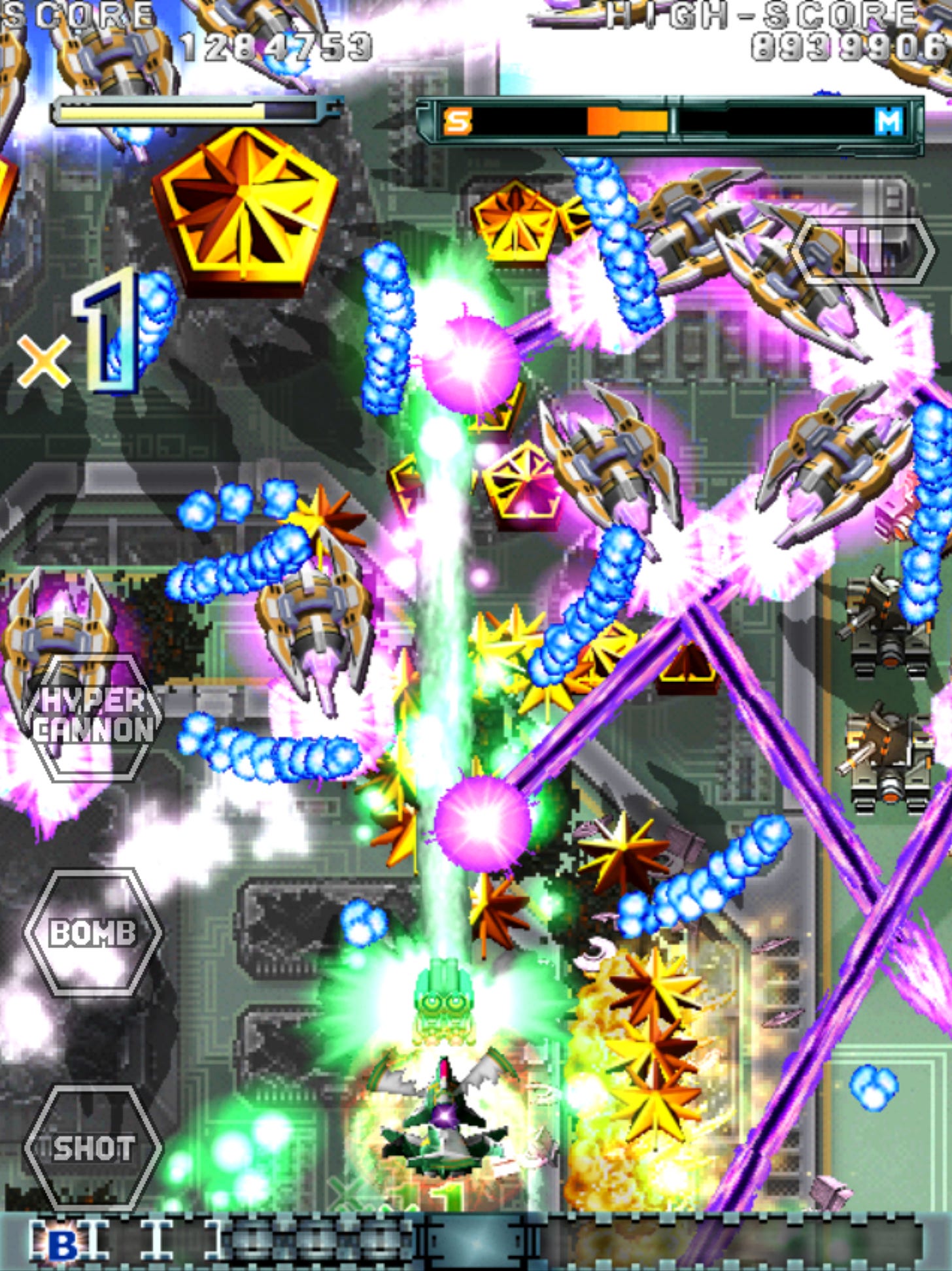 A screen filled with waves of blue bullets, purple and green lasers, and enemy ships