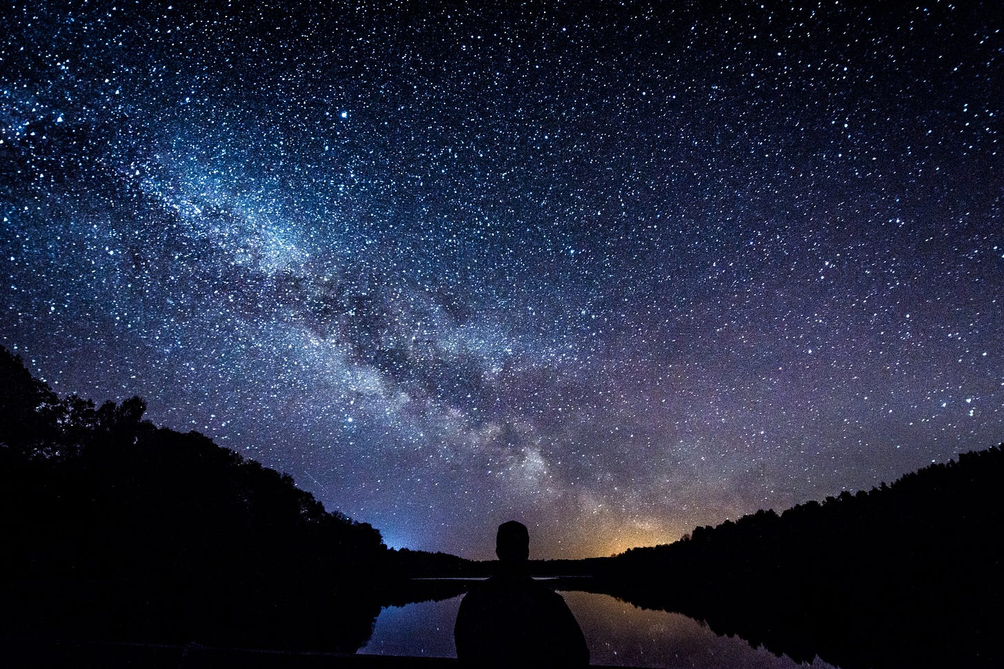 Alone under stars - Photo by Mindaugas Vitkus on Unsplash