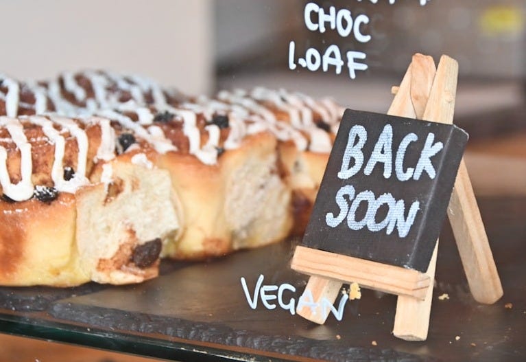 a group of pastries on a black surface