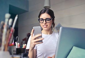 Image by bruce mars of a woman on her phone