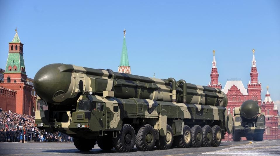 A Russian intercontinental ballistic missile cheered by crowds filling Moscow's Red Square