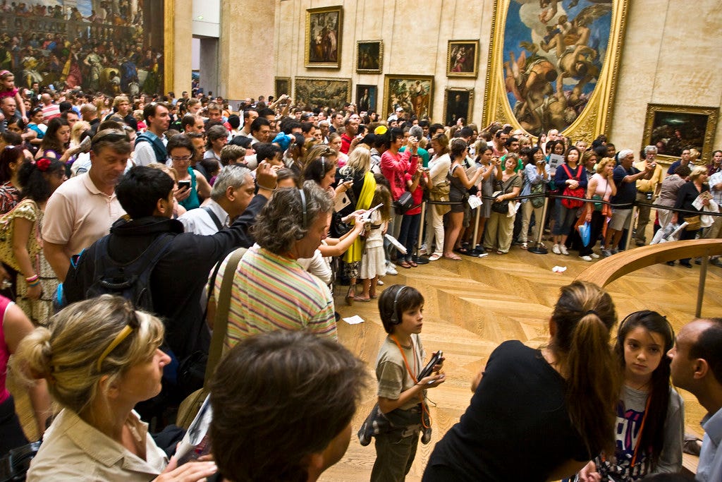 Mona Lisa's Crowd | Everyone just wants to take a picture of… | Flickr