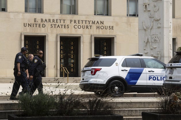 Department of Homeland Security Federal Protective Service agents patrol the E. Barrett Prettyman U.S. Courthouse in Washington.