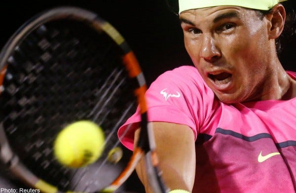 rafael nadal hitting hard for fabio fognini rio open 2015