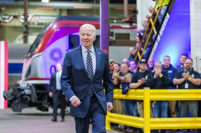 President Biden walks to deliver remarks at a railway event in Delaware.