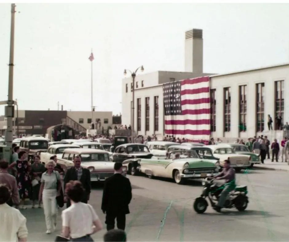 Celebrating Alaska statehood, the Federal building in downtown Anchorage displays a huge USA flag featuring a 49th star.