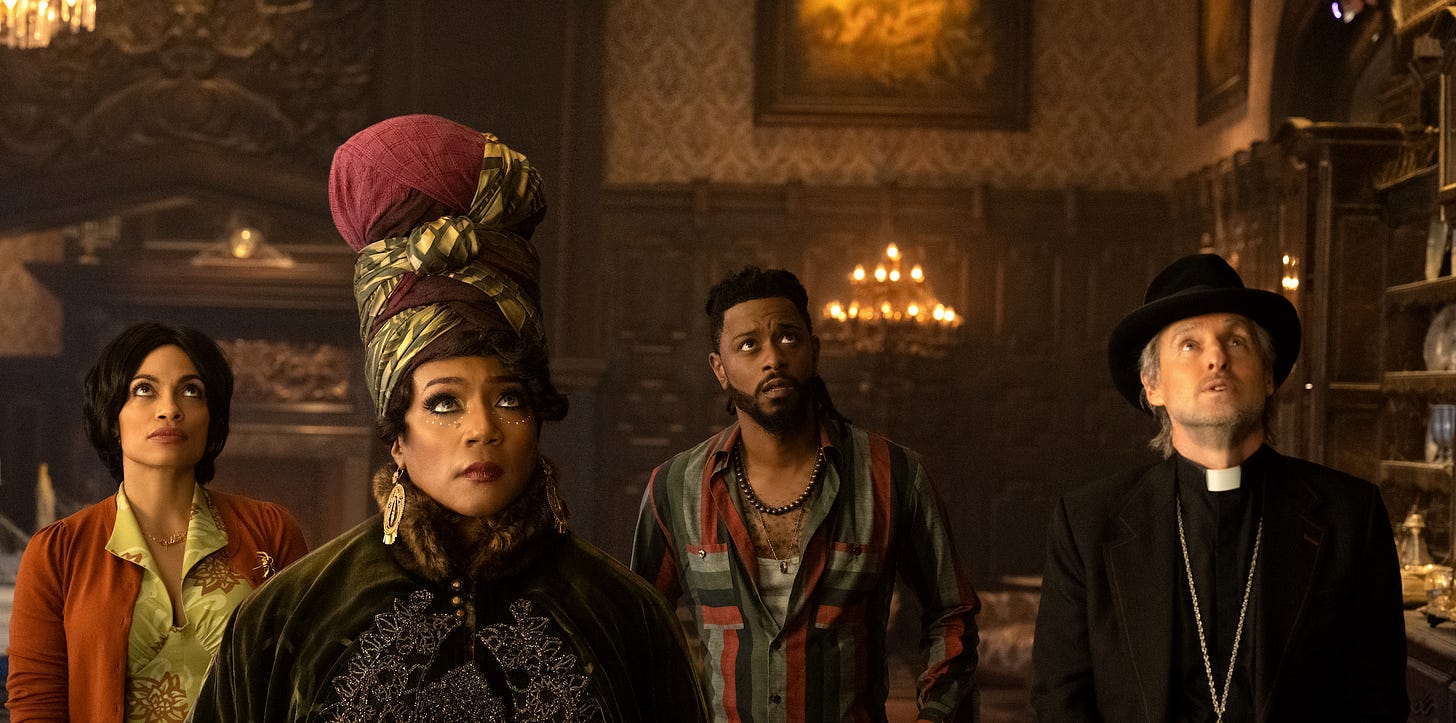 Rosario Dawson, Tiffany Haddish, LaKeith Stanfield, and Owen Wilson in Haunted Mansion