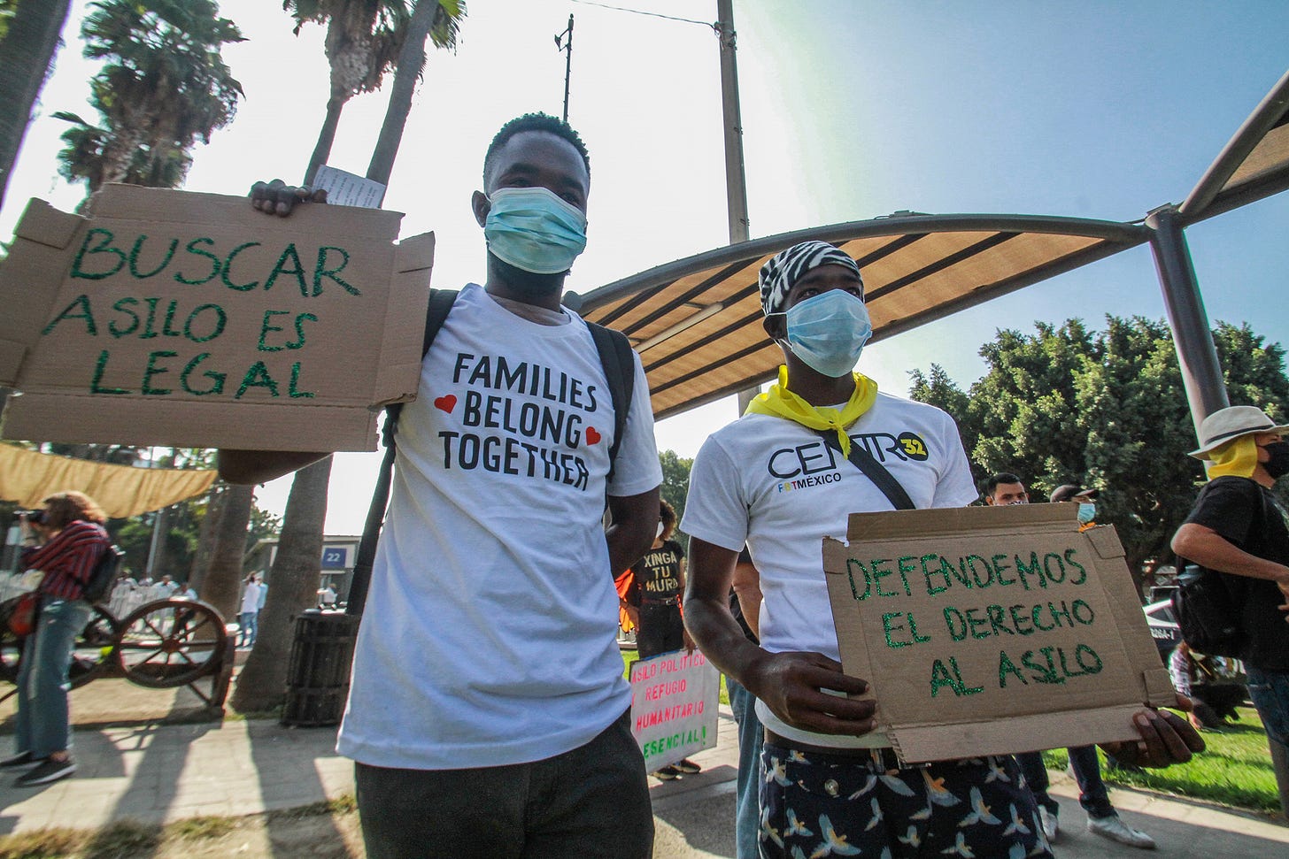 Migrants of Haitian origin protest at the international gate of San Ysidro, Mexico, 21 October 2020. Hundreds of migrants protested near the Mexican border city of Tijuana demanding attention to their refugee requests in the United States, delayed by the COVID-19 pandemic. (Joebeth Terriquez—EPA/EFE/Shutterstock)