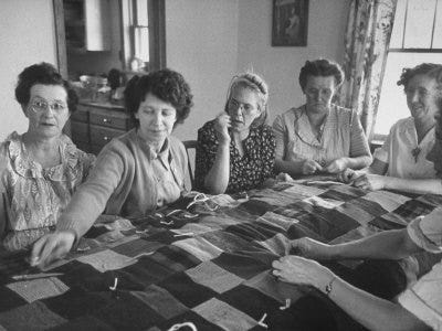 A quilting bee... — A Gathering of Stitches