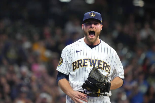 Corbin Burnes of the Milwaukee Brewers reacts to striking out a batter in the first inning against the Washington Nationals at American Family Field...