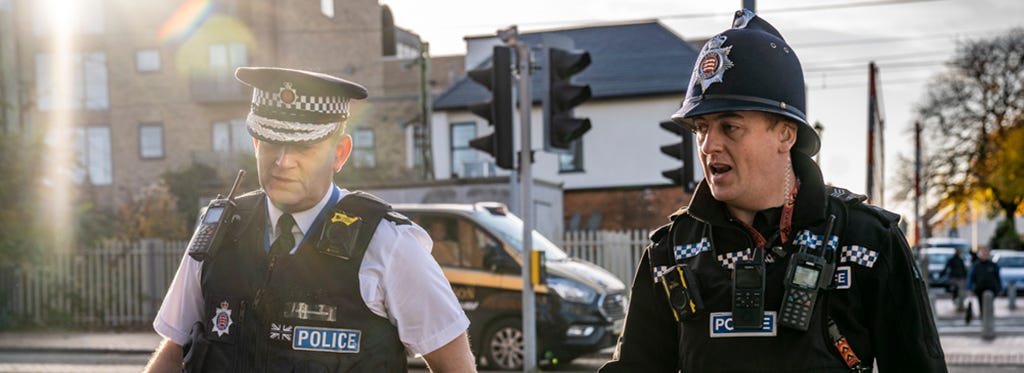 Chief Constable BJ Harrington on patrol with a uniformed police sergeant.