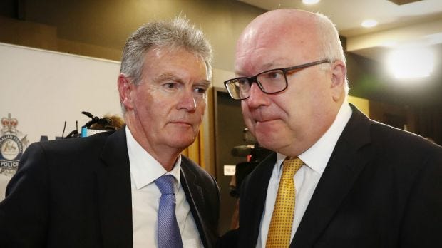 ASIO Director-General of Security Duncan Lewis and Attorney-General Senator George Brandis in May.