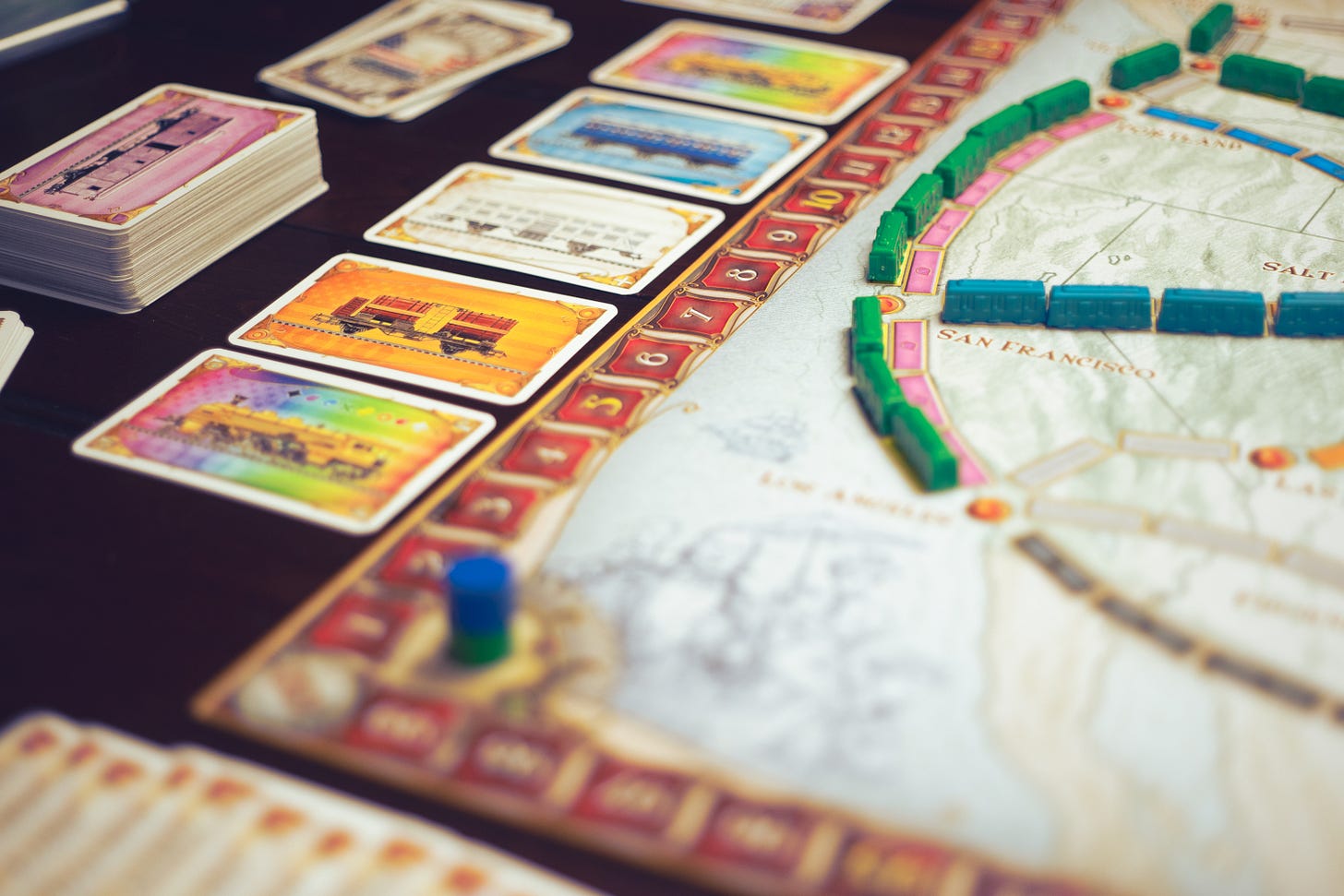 The board game Ticket to Ride being played on a table.