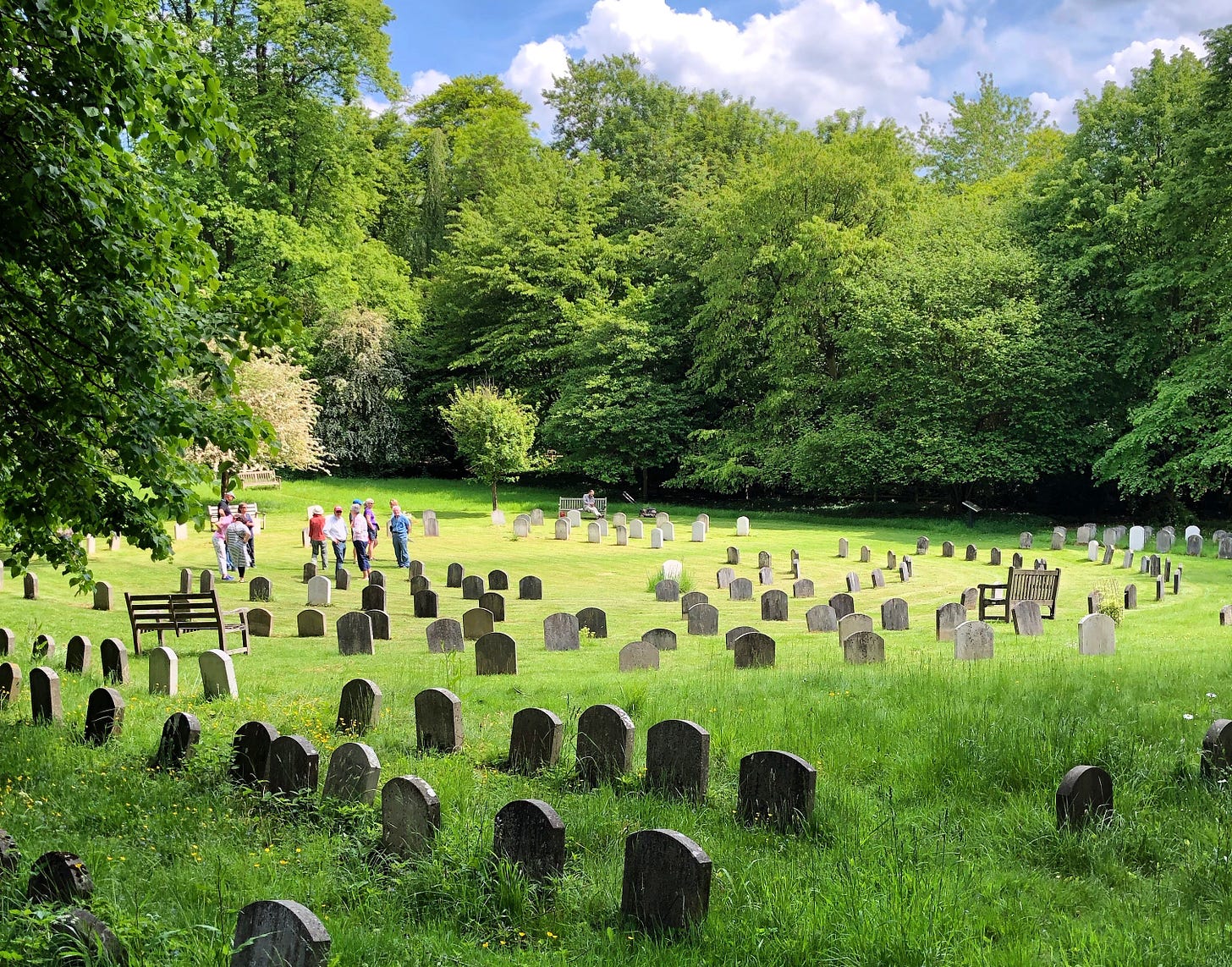 The graveyard at Jordans Meeting House are arranged as if in the meeting house