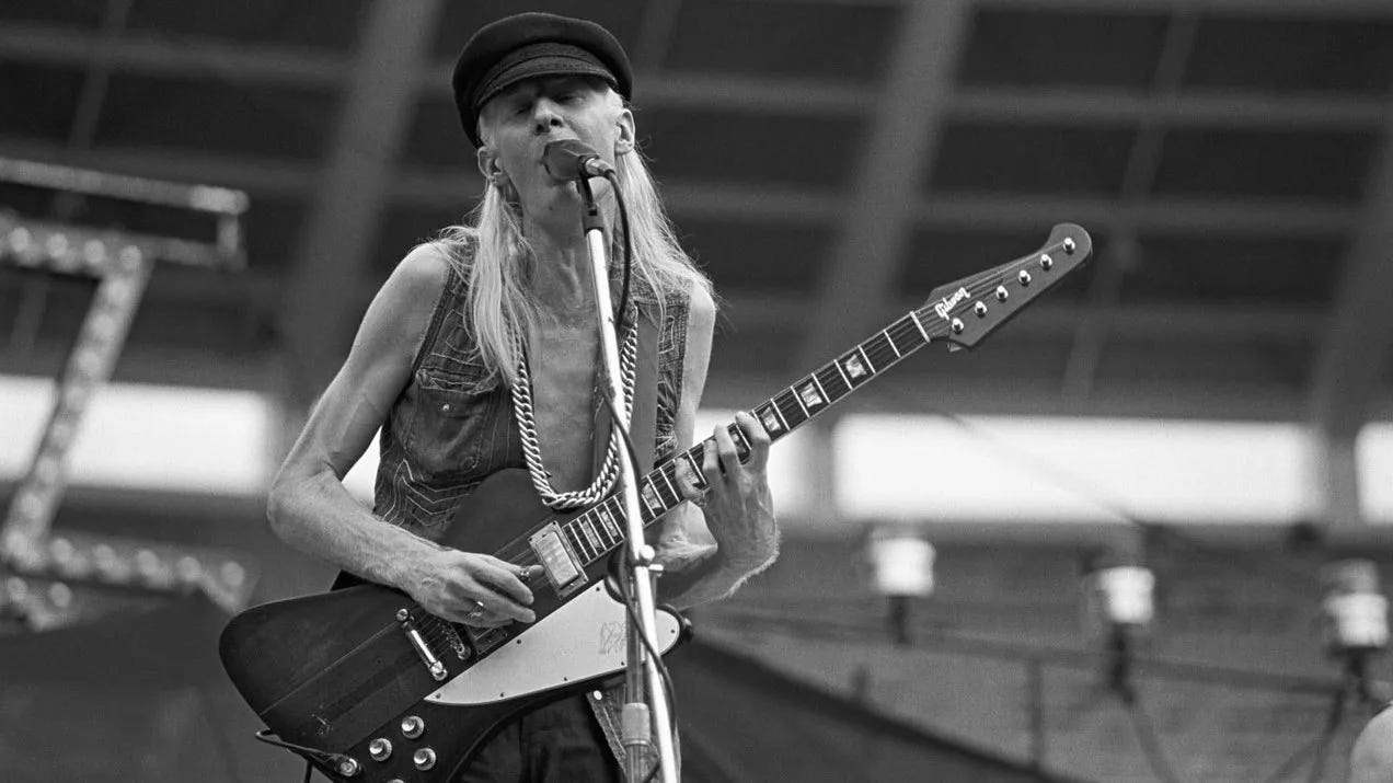 Johnny Winter with his Gibson Firebird 
