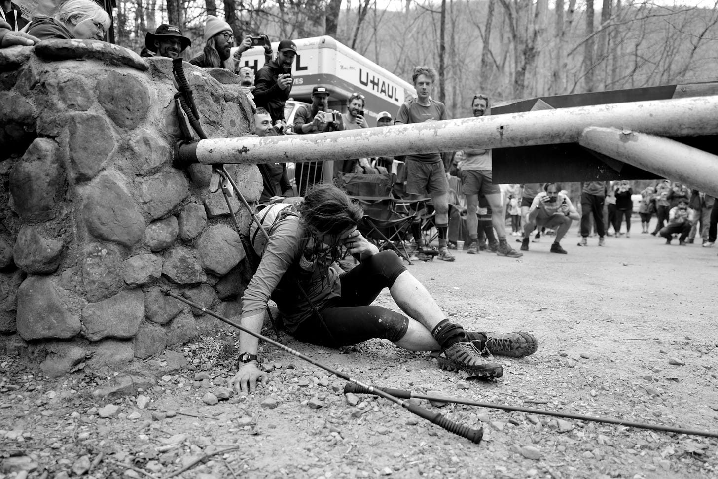 Jasmin Paris collapsed at the famous gate at the Barkley Marathons / © David Miller