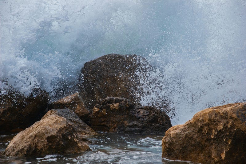 Waves hitting rocks