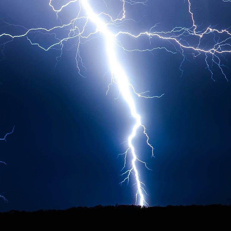 lightning strike during blue sky lightning strike during blue sky