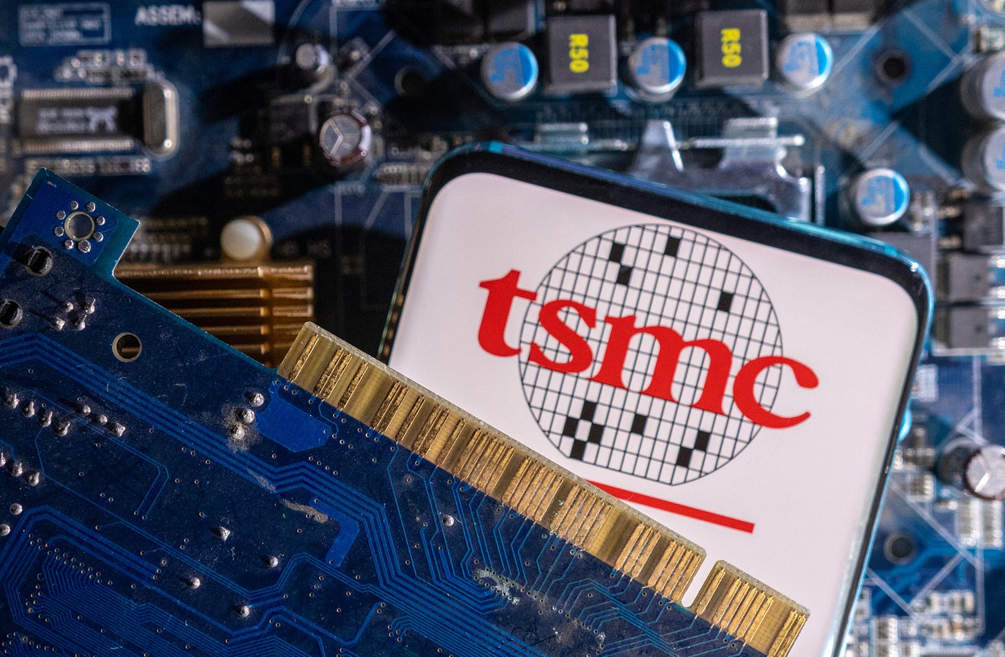 TSMC bullish on AI demand, forecasts 20% revenue growth this year | Reuters