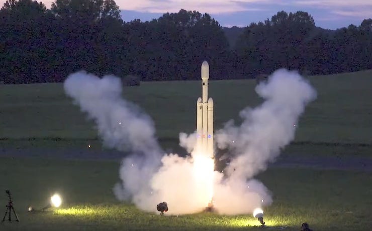 Yes, that's a model rocket, not the dawn launch of a SpaceX vehicle.
