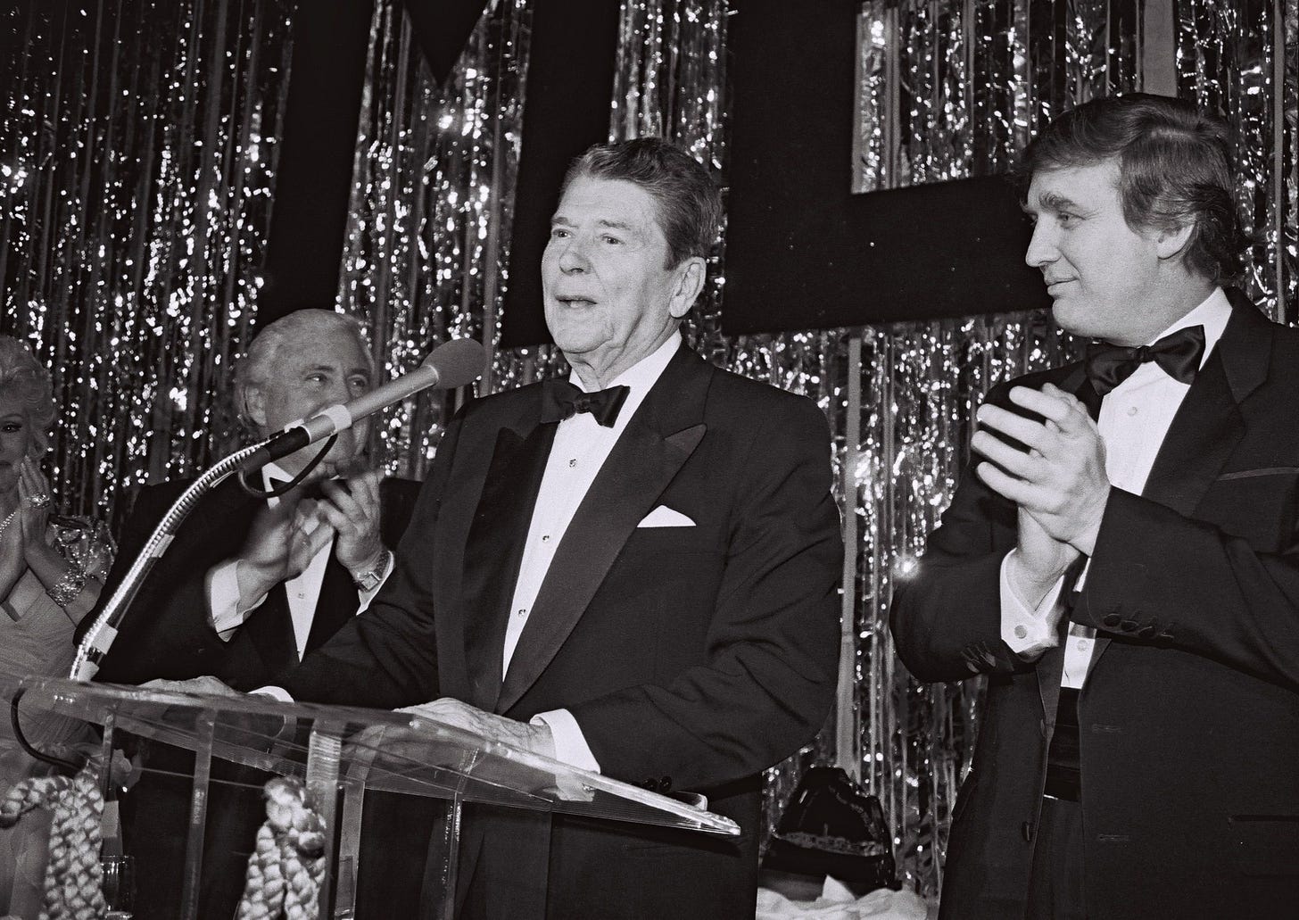 Image may contain Ronald Reagan Musical Instrument Musician Human Person Suit Coat Clothing Overcoat and Apparel