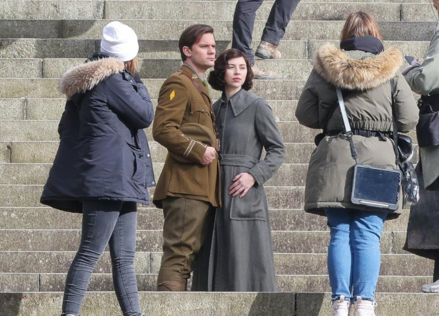 People on steps filming new Outlander series.